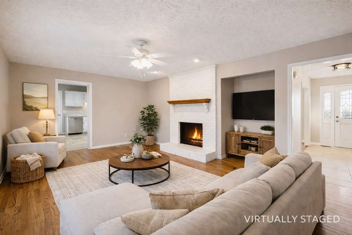 Country home with warm family room and classic brick hearth...