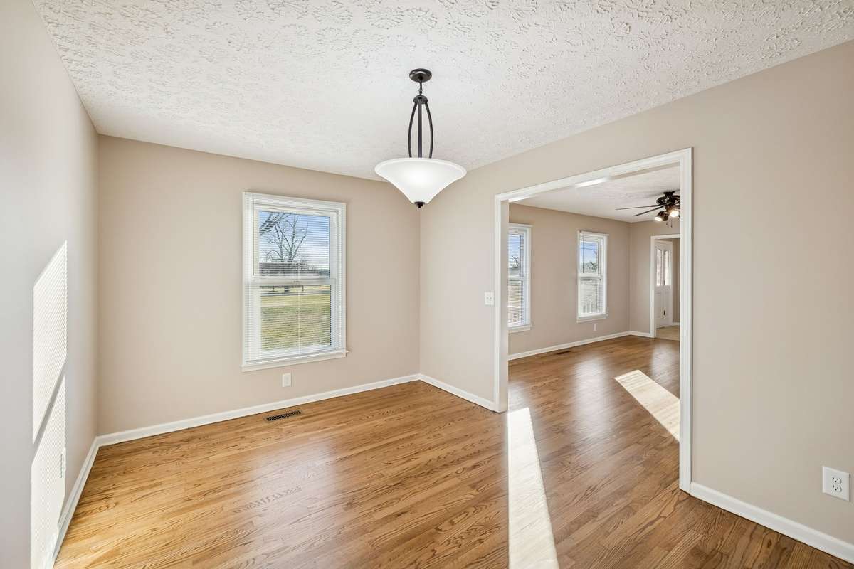 Classic ranch layout with defined dining area...