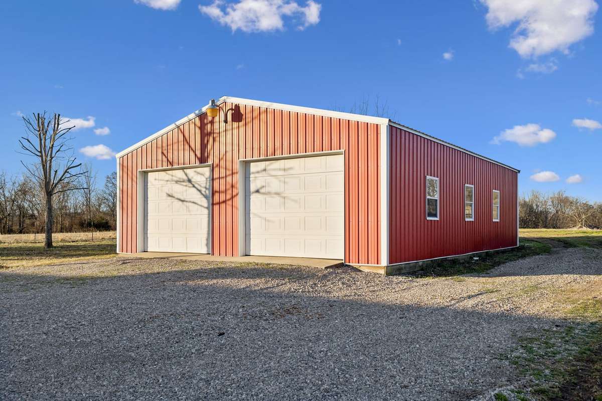 30x40 detached workshop with dual garage doors...