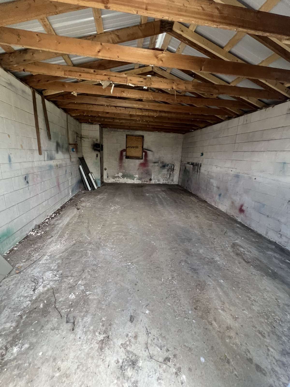 Garage #1 12x20 Both garages are side by side great potential to rent out for handy man or mechanic work!