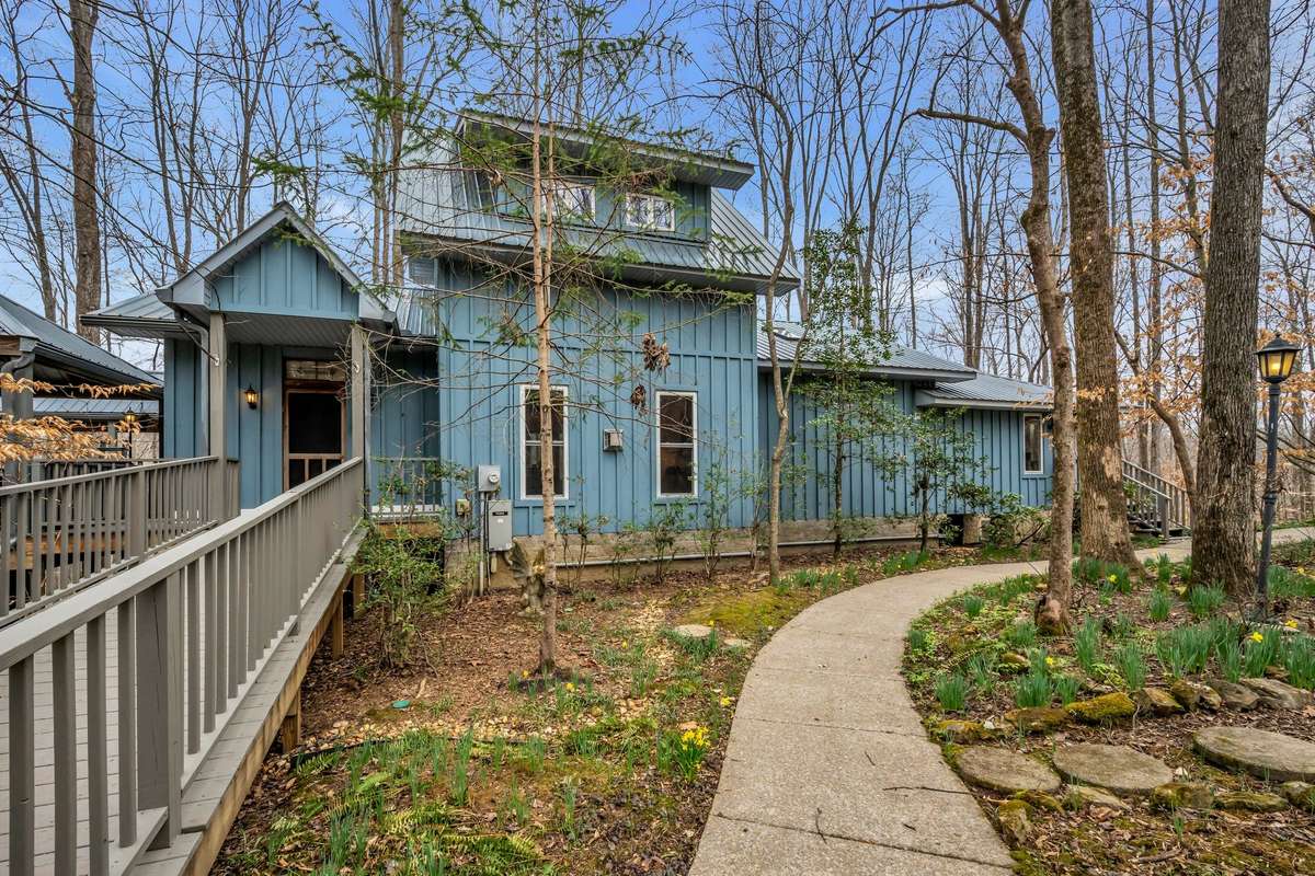 Easy Access Inside and Out , pathway to sitting area with stepping stones to park like area