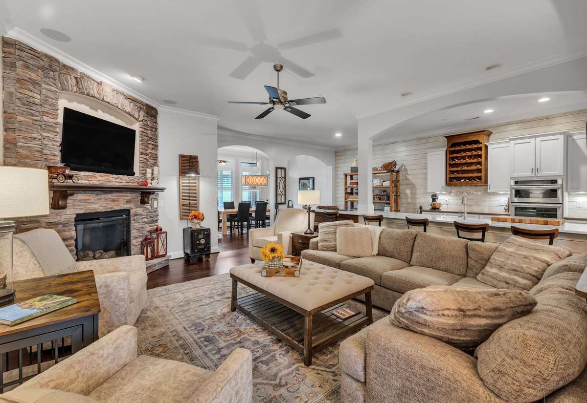 The Cozy Luxurious Great Room with Gas 
Fireplace - Open area with Dining Room just 
steps away and the 20' Counter Top -Family
Time or Anytime - This is truly a home that
Has It All!