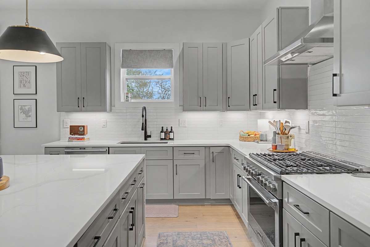 Large Gas Range and Beautiful Lighting...A Decorators Dream