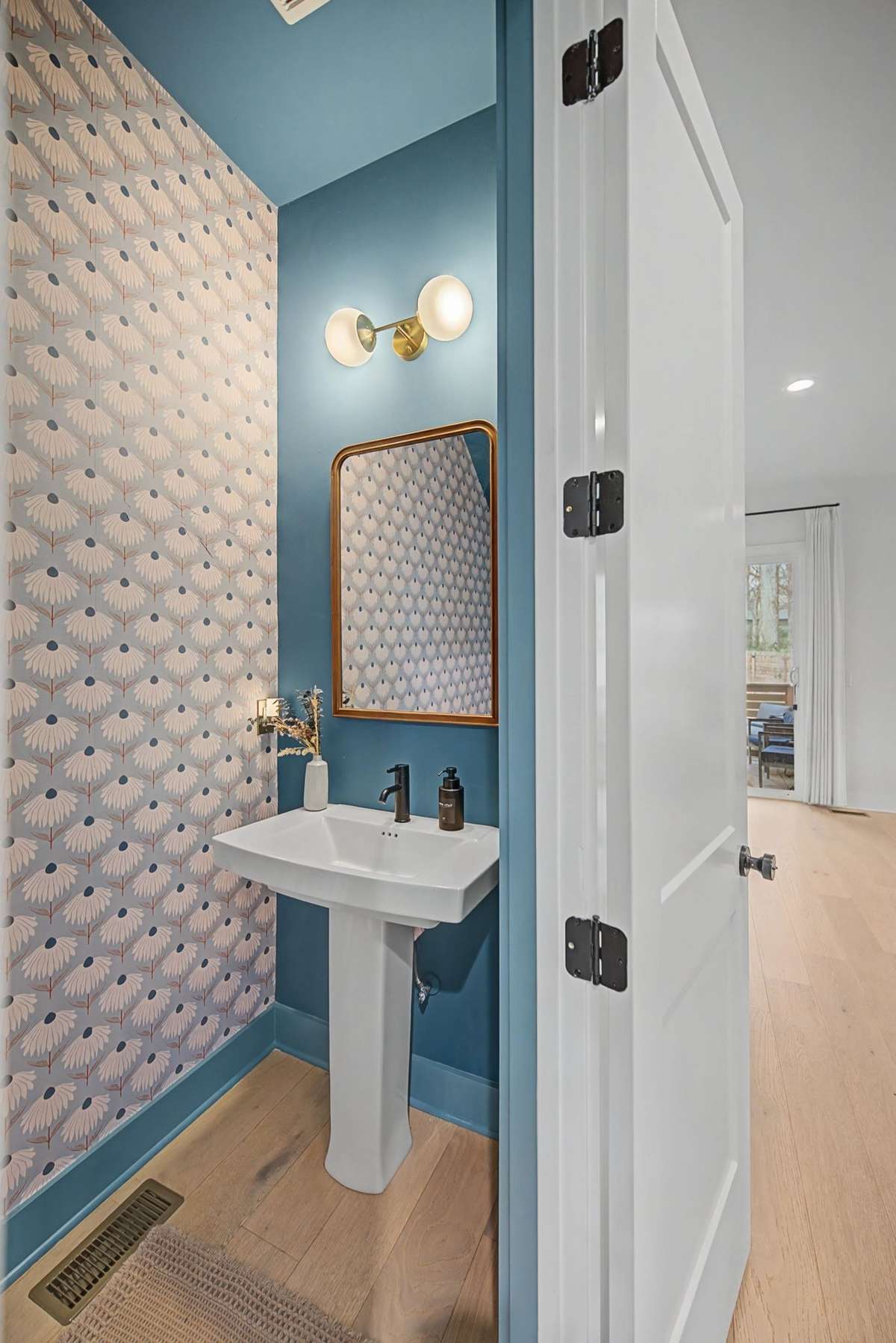Beautiful Guest Bathroom on the Main Floor... And if You Look Closely You will See a Dolly Parton Doll--Love the Nashville Touch!