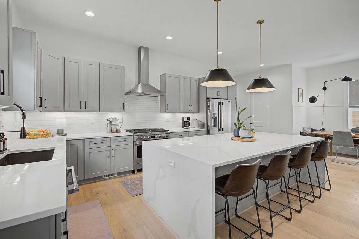 Kitchen Offers Ample Cabinet Storage and Plenty of Counter Space for Meal Preparations.