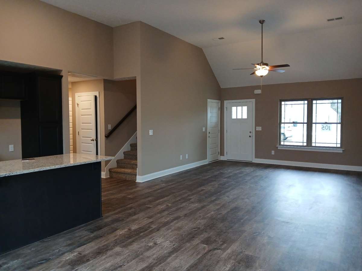 Living Room is Open to the Kitchen.  Picture of Previous House.