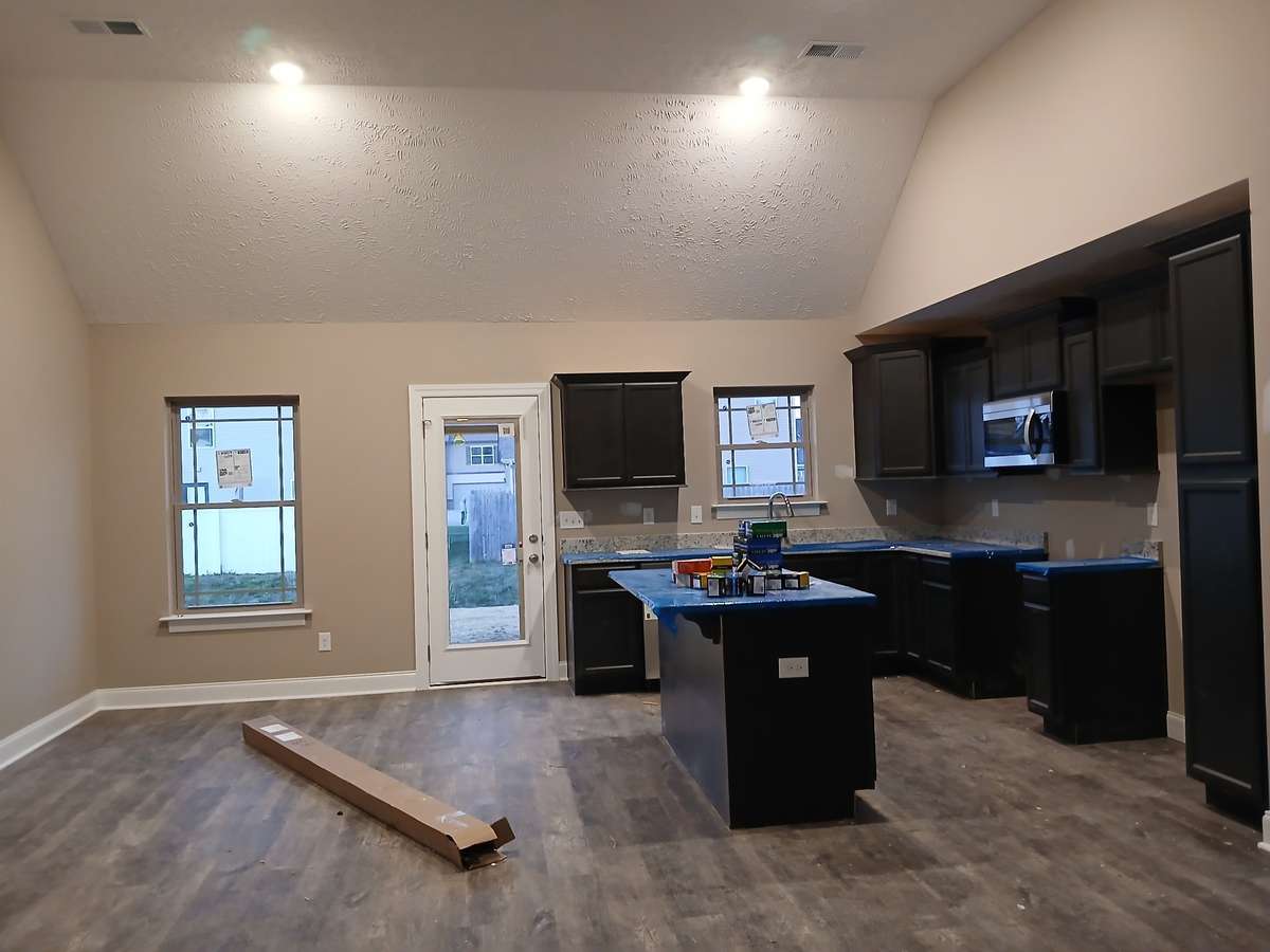 Living Room is Open to the Kitchen and Dining Area.