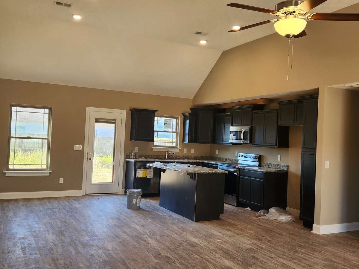 Welcome Home to Your Spacious Kitchen and Dining Room with Vaulted Ceiling.