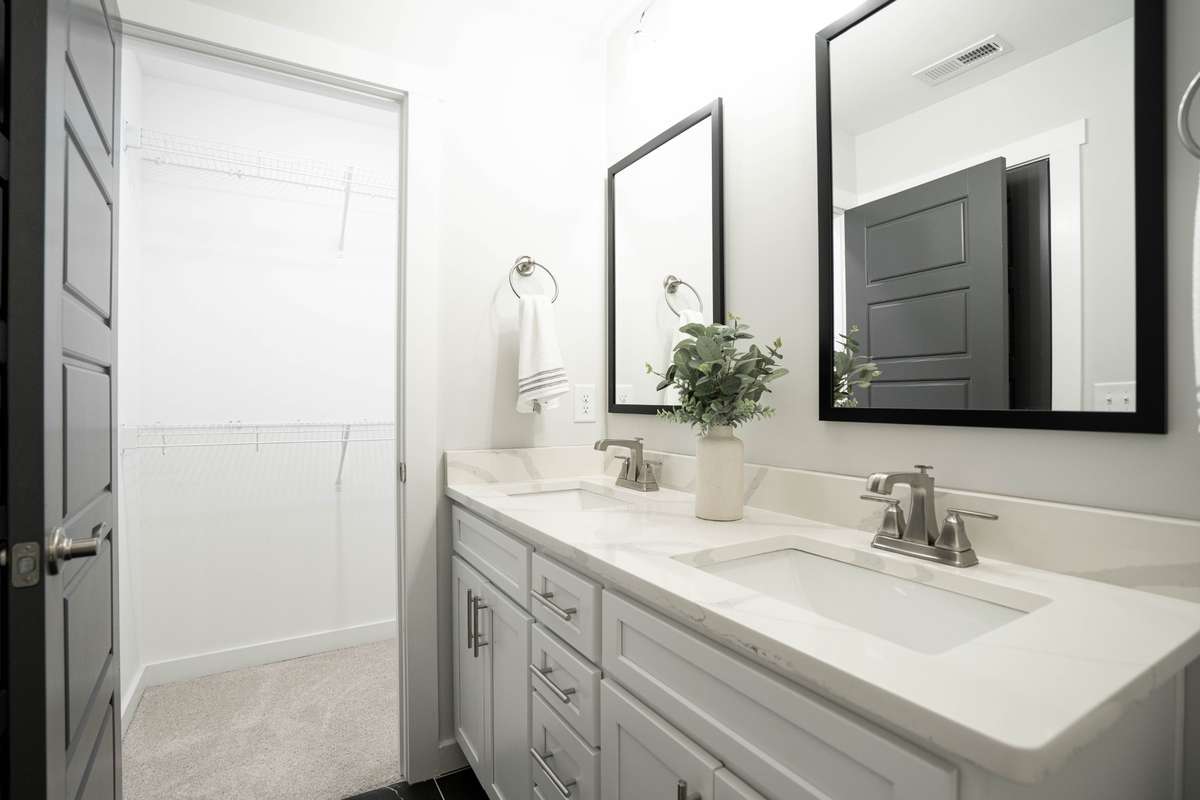 Double Vanities and framed mirrors in Primary Suite upstairs