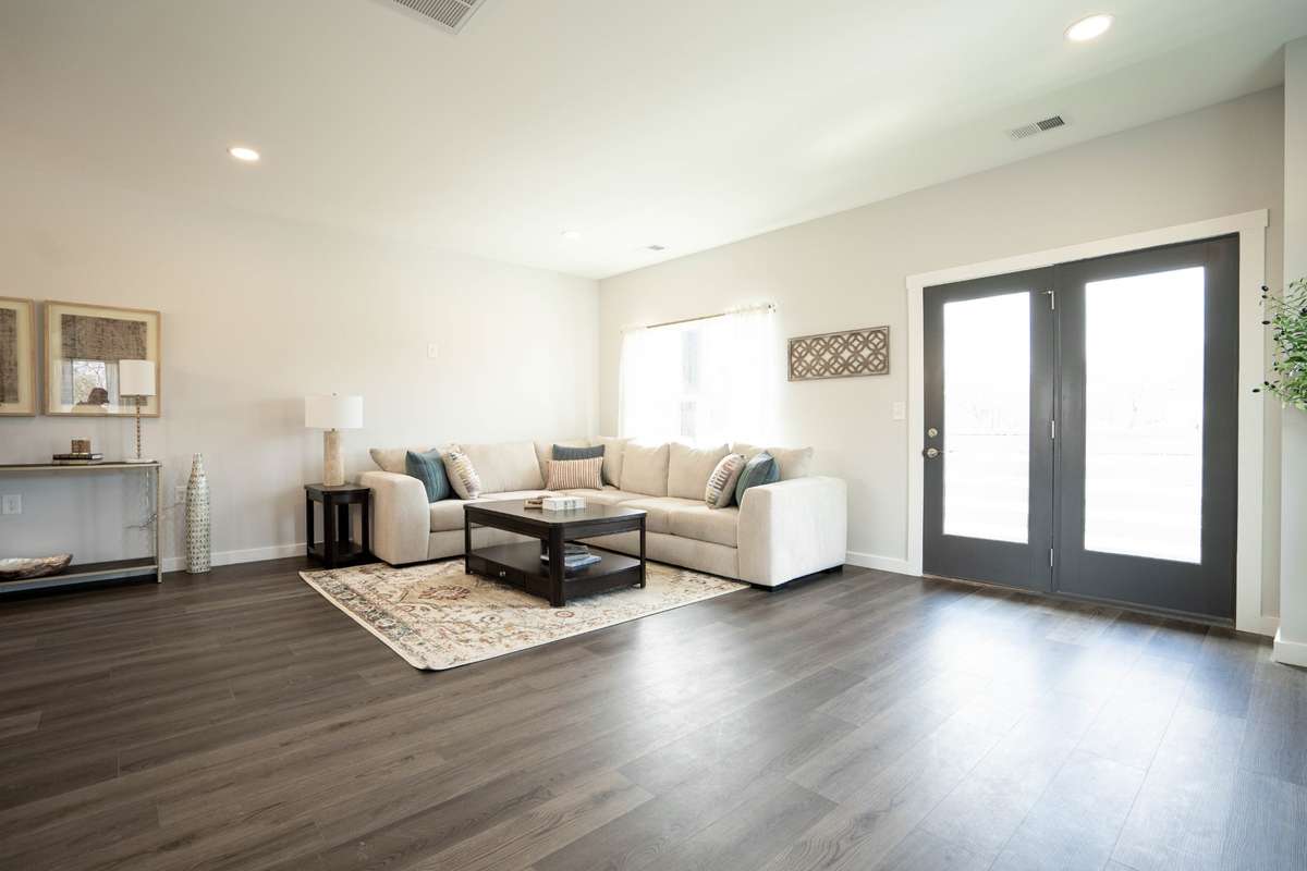 Extra large living room area with door to deck.