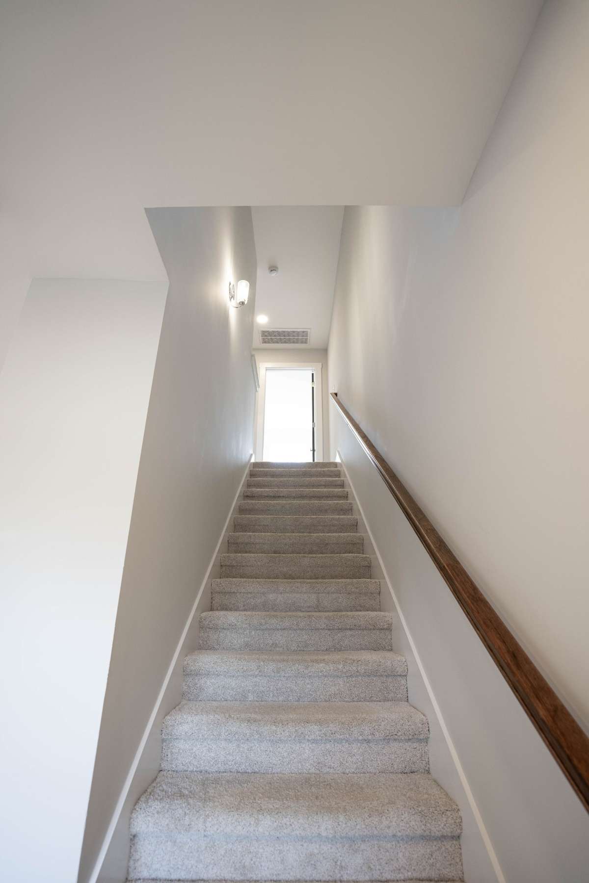 Stairs to private living area. Primary and secondary bedrooms/baths