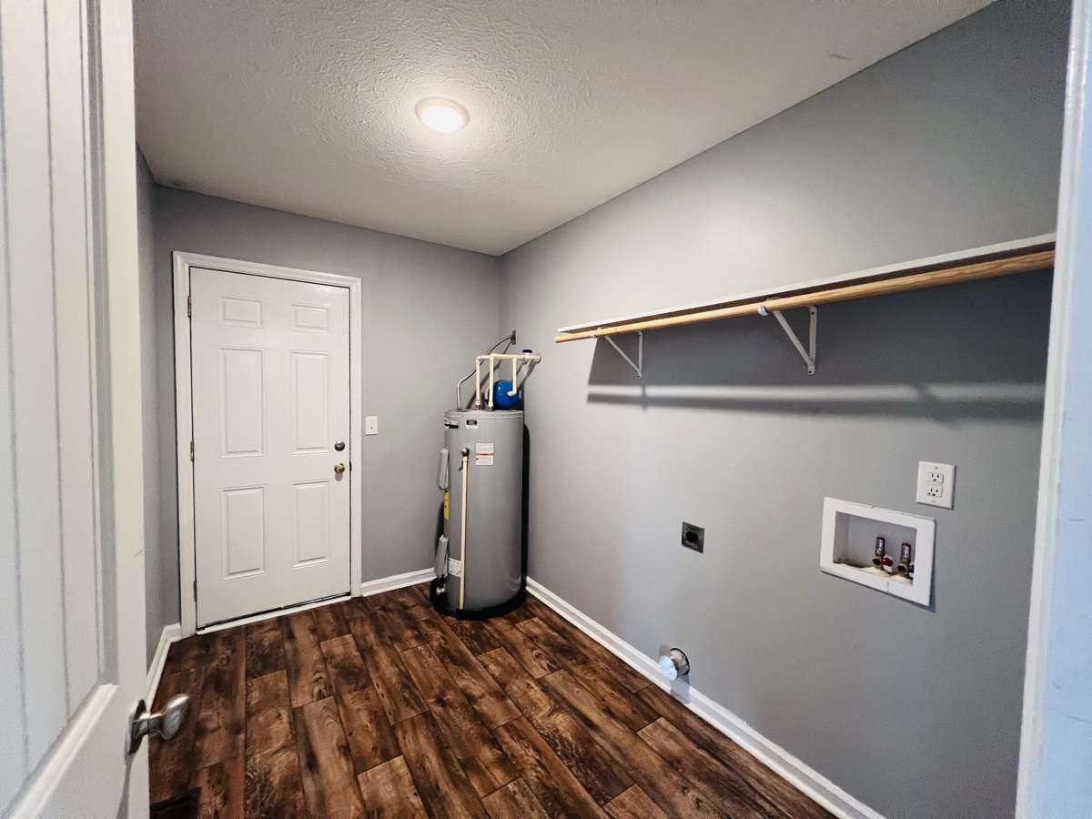 Laundry room with access to the garage
