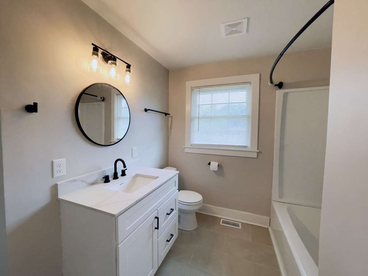 All New Main Bath with Tile Floors.