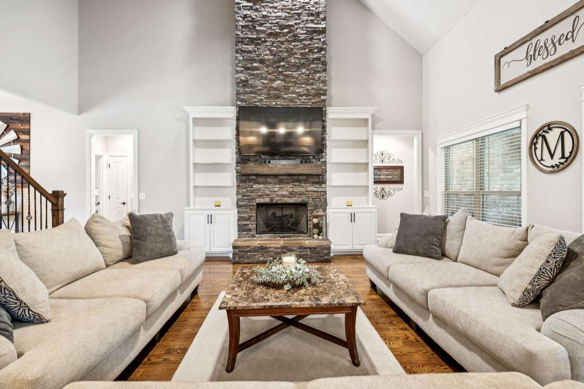 Brick fireplace with built-in bookshelves! An entertainer's dream.