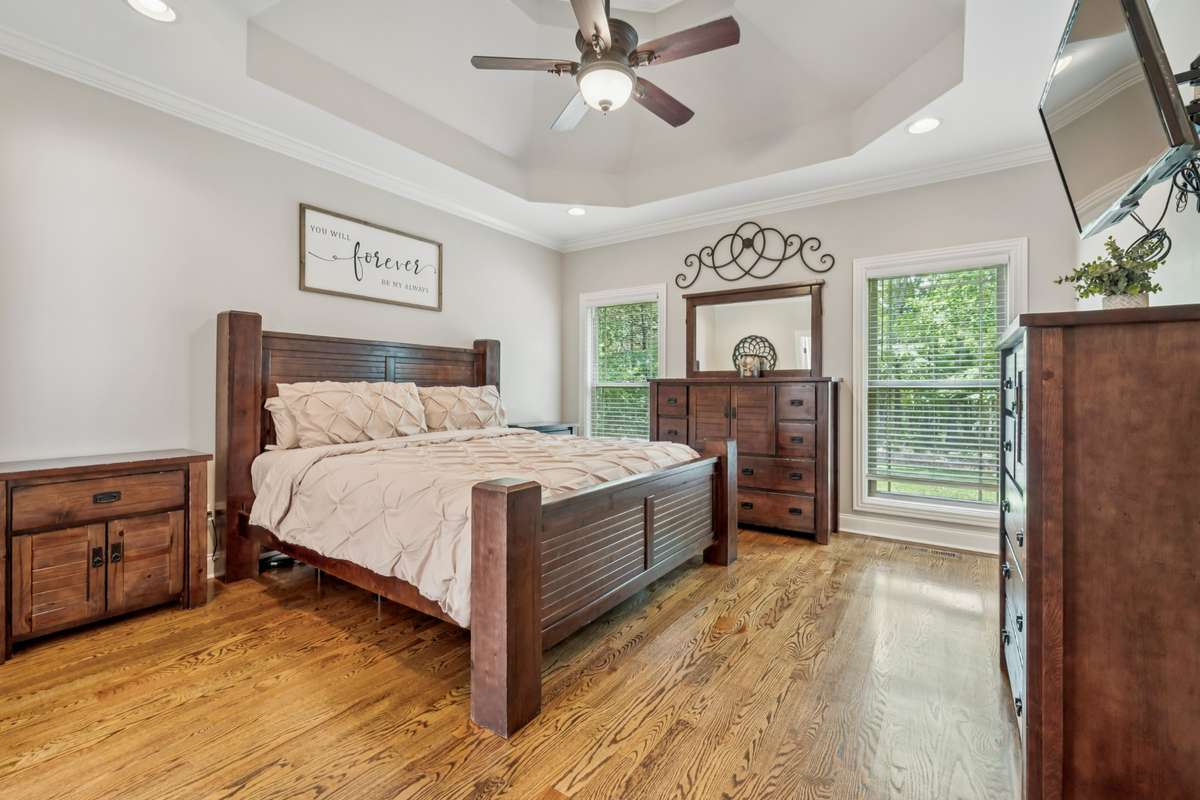 Master bedroom with double vanity bathroom, separate shower and tub, and extra large walk in closet!