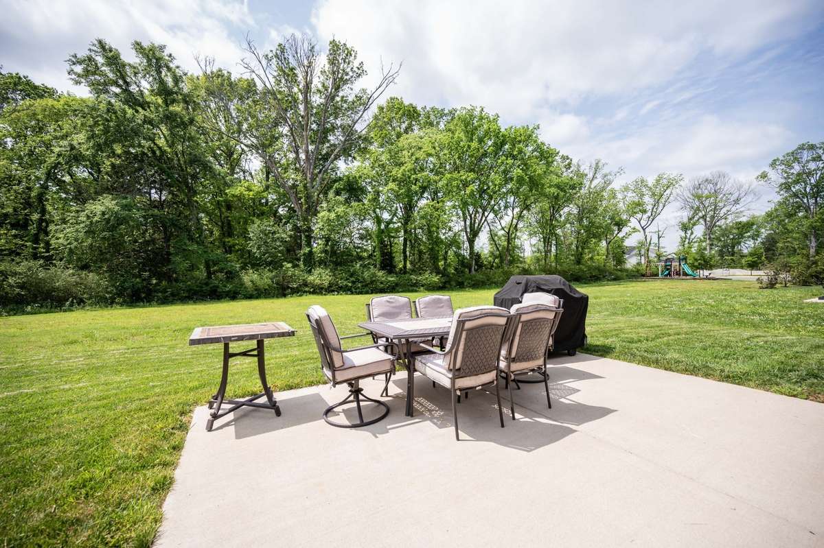 Extra concrete off covered patio