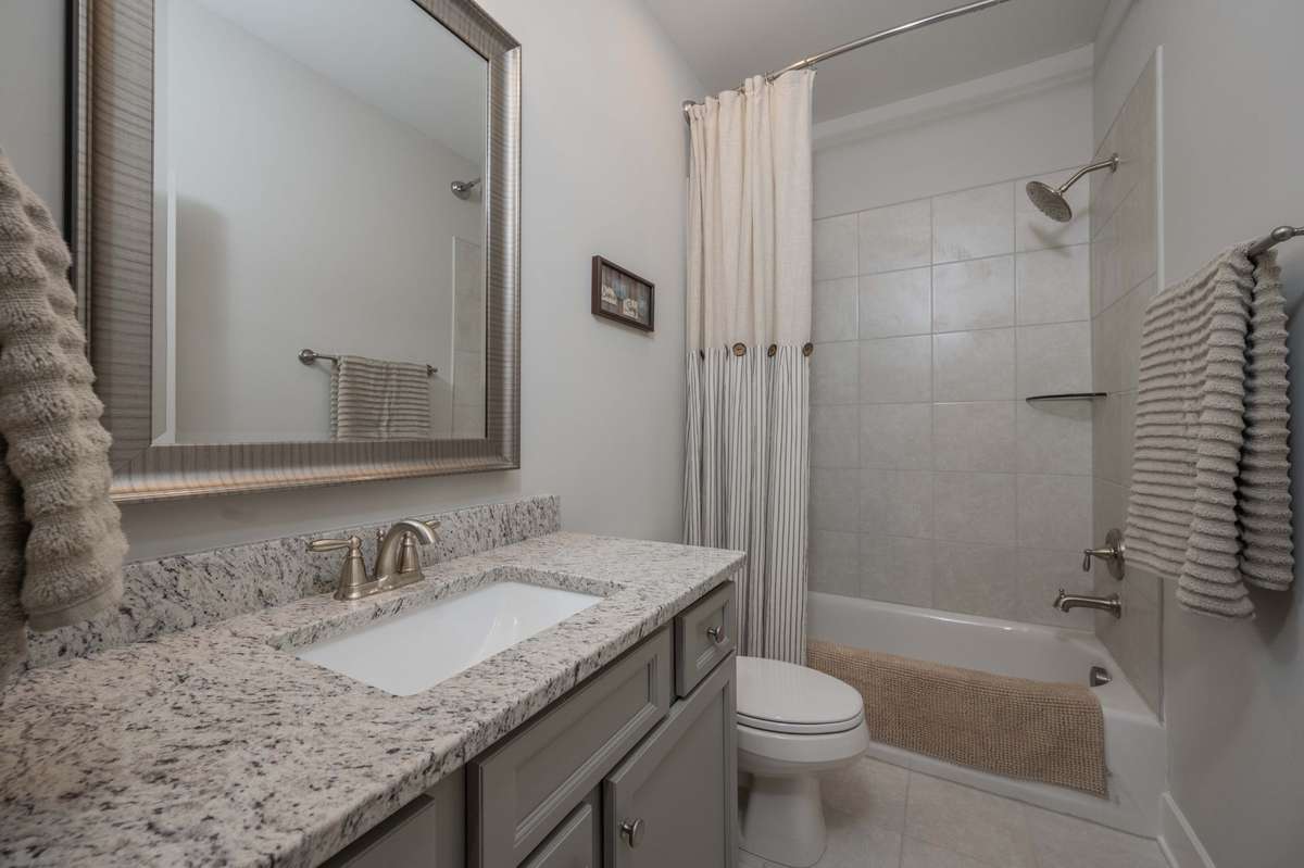 Bath 4 upstairs located next to bedroom 4