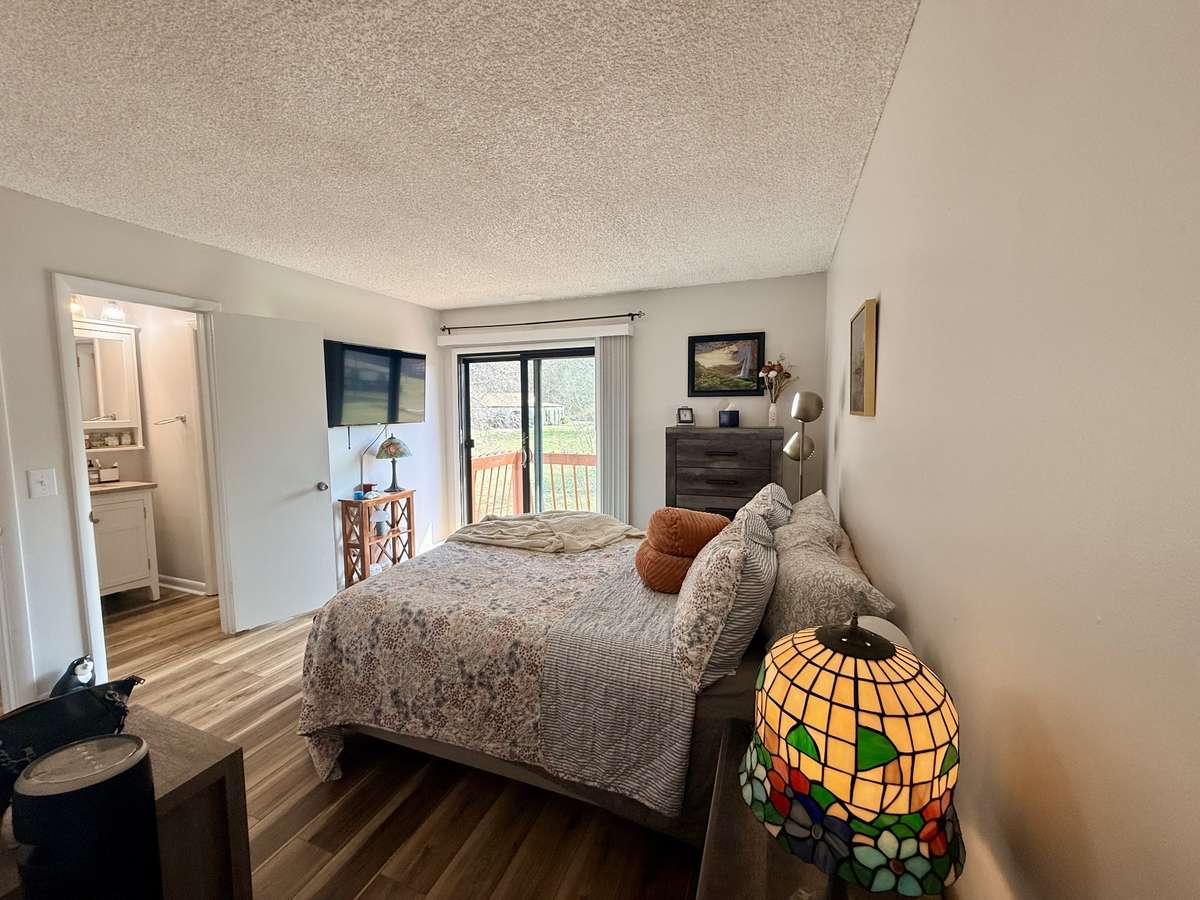 Another view of Bedroom 1 with attached bathroom