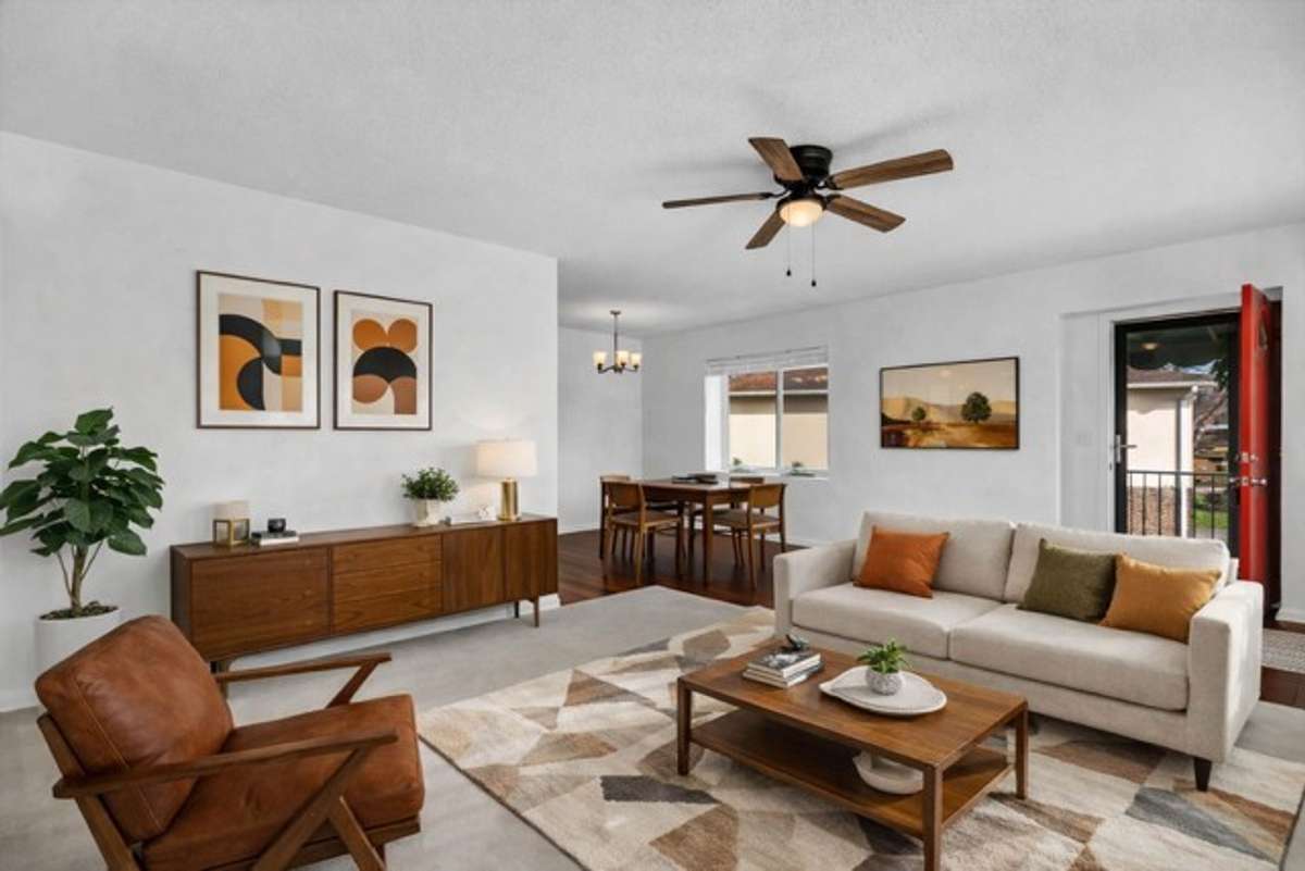 Virtual staged living room and eat in area