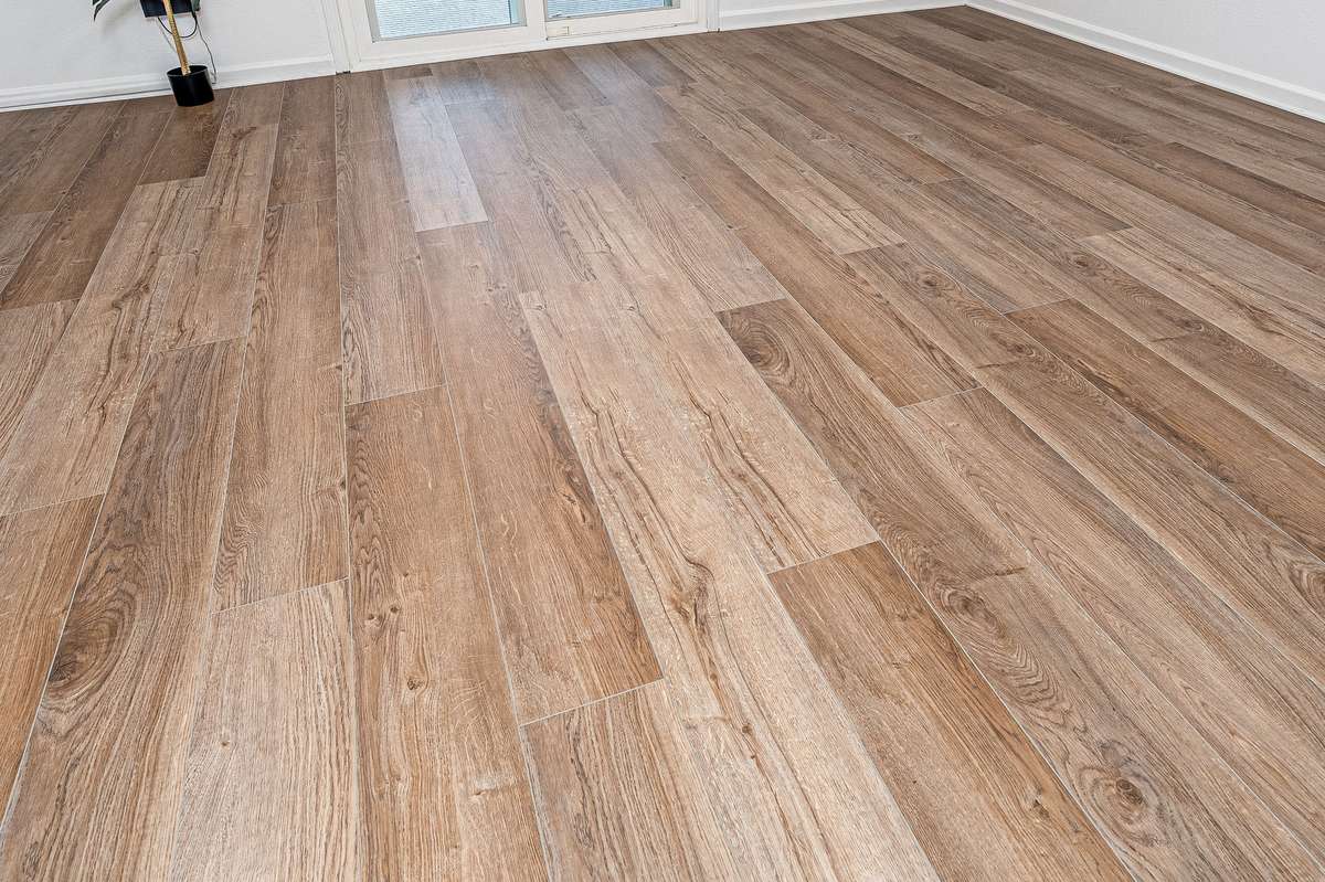 Attractive waterproof LVP flooring throughout downstairs