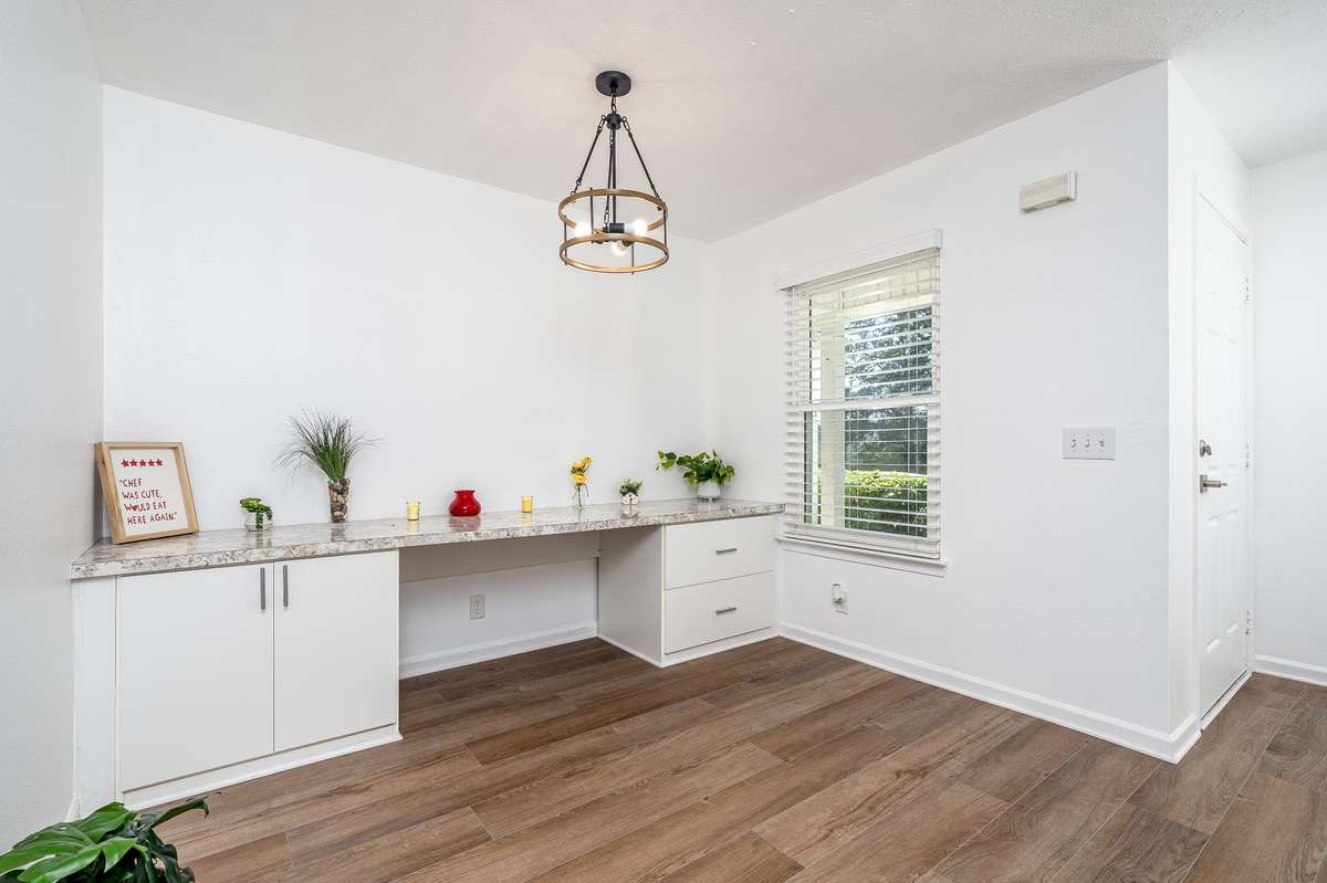 Could also be used as a home office with cool built-ins & sunny window