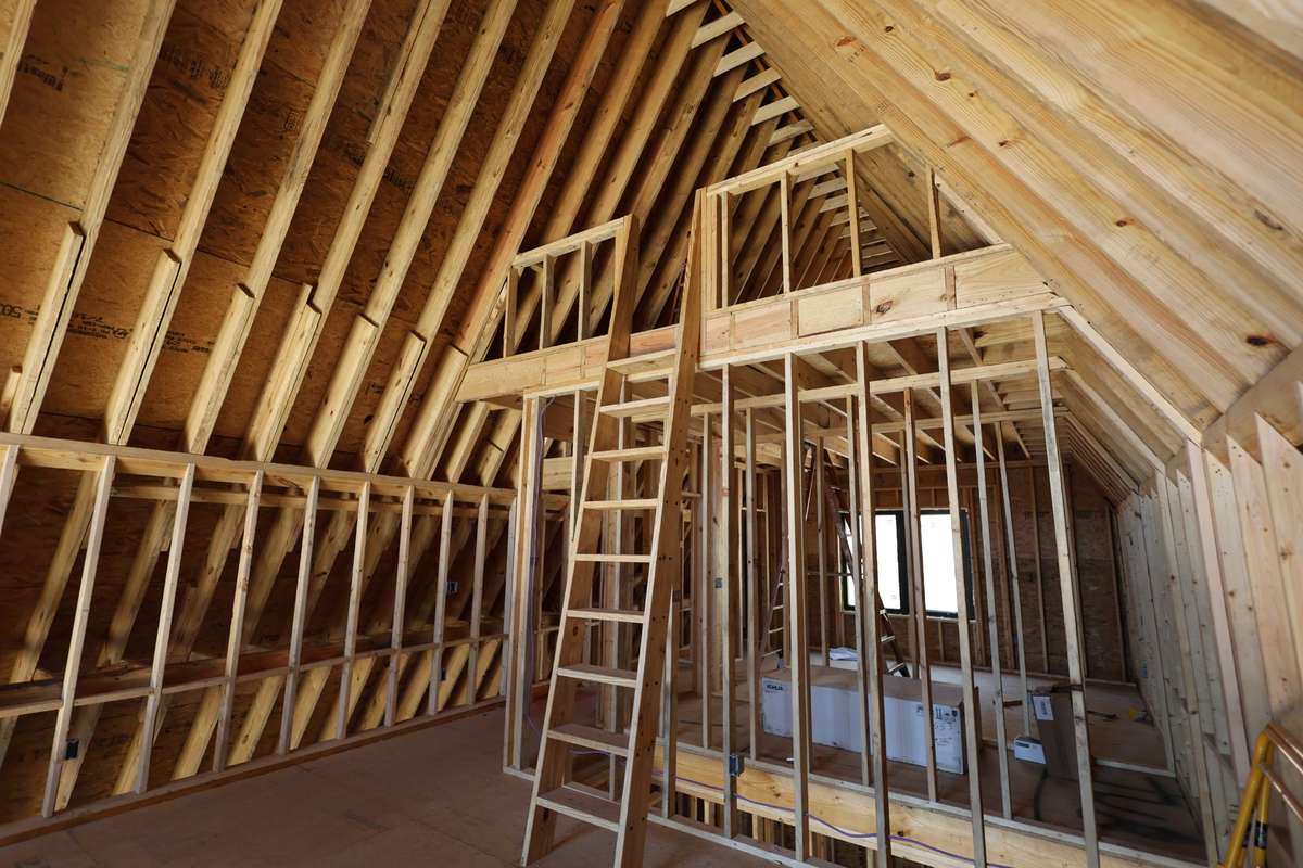 2nd floor looking up to 3rd floor loft.