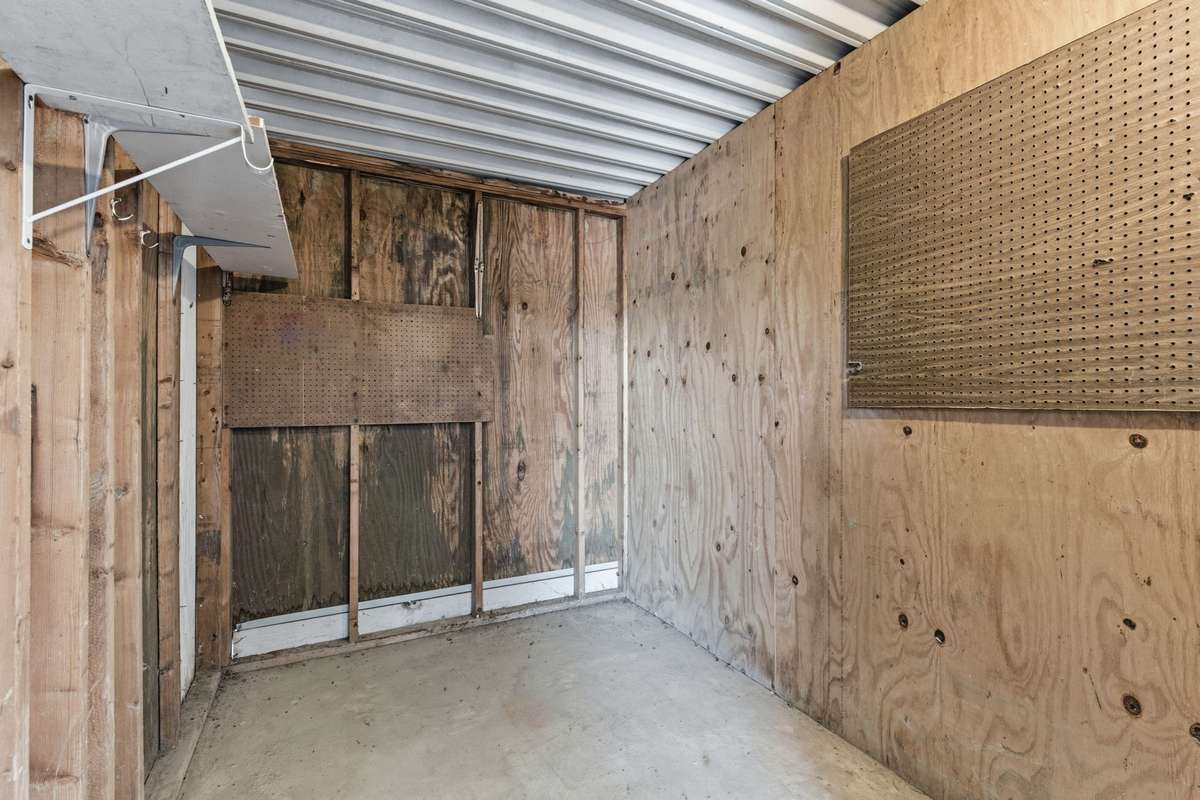 Inside of the storage area next to the carport.
