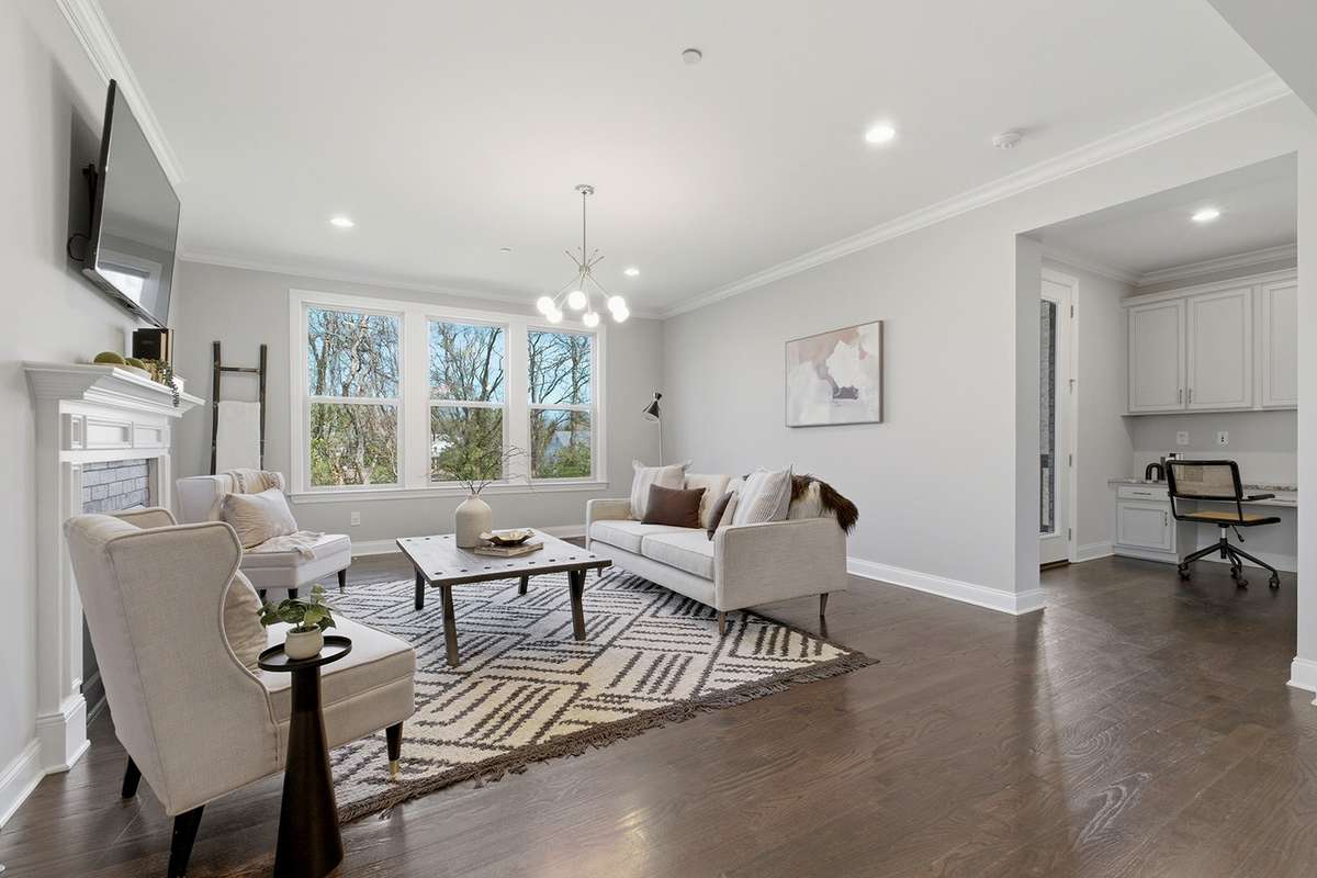 Lots of natural light, high ceilings w/crown molding throughout