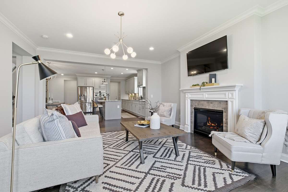 Dining + kitchen flow into the living room