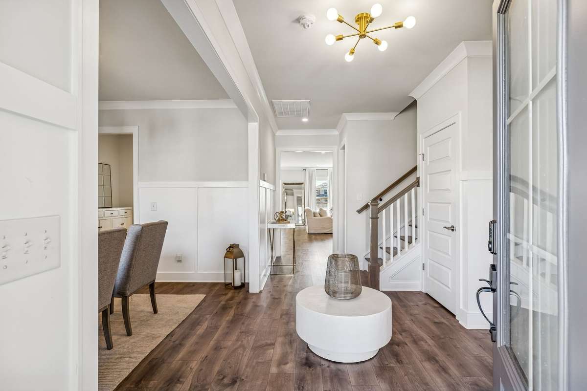 Open foyer features contemporary lighting, timeless flooring, and custom millwork! 606 Rumsford Lane, Mt Juliet, TN 37122