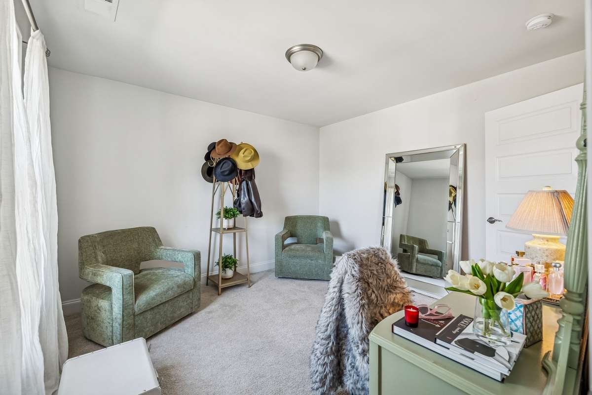 Bedroom four upstairs with neutral color palette and walk in closet! 606 Rumsford Lane, Mt Juliet, TN 37122
