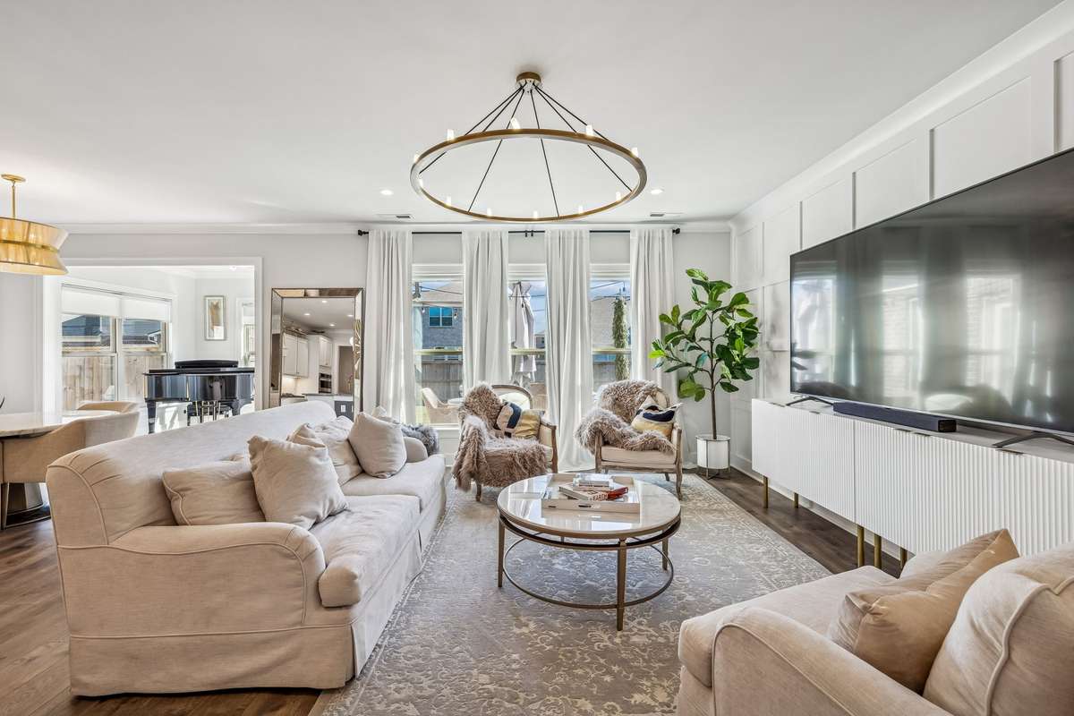 This light-filled living room strikes the perfect balance between modern style and everyday comfort! 606 Rumsford Lane, Mt Juliet, TN 37122