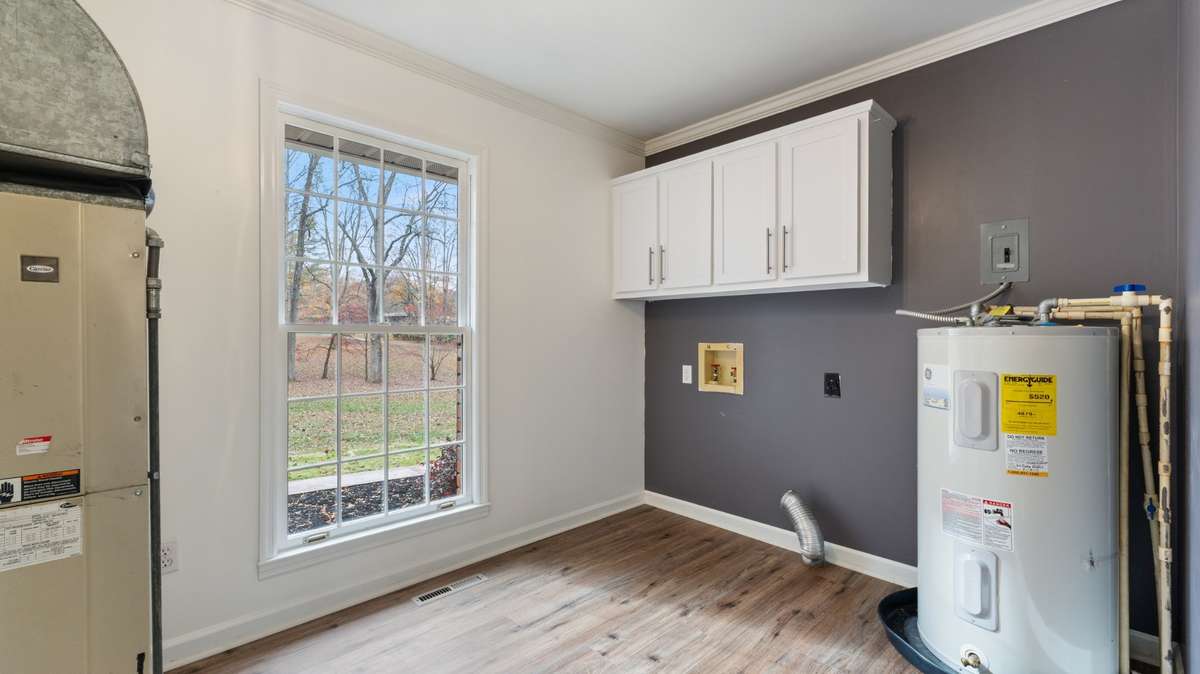 Laundry room with lots of natural light.