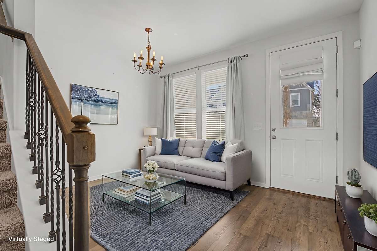 Virtually staged. This space can be used as a den, office, or dining room.