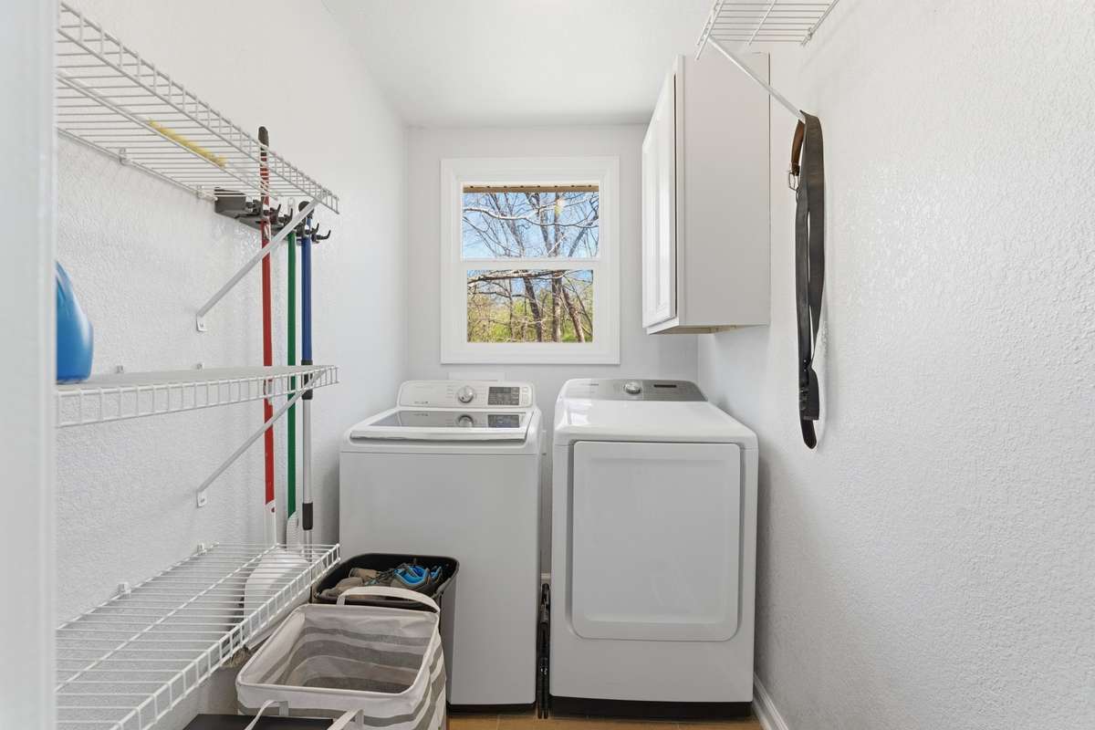 Laundry room off the hallway upstairs
