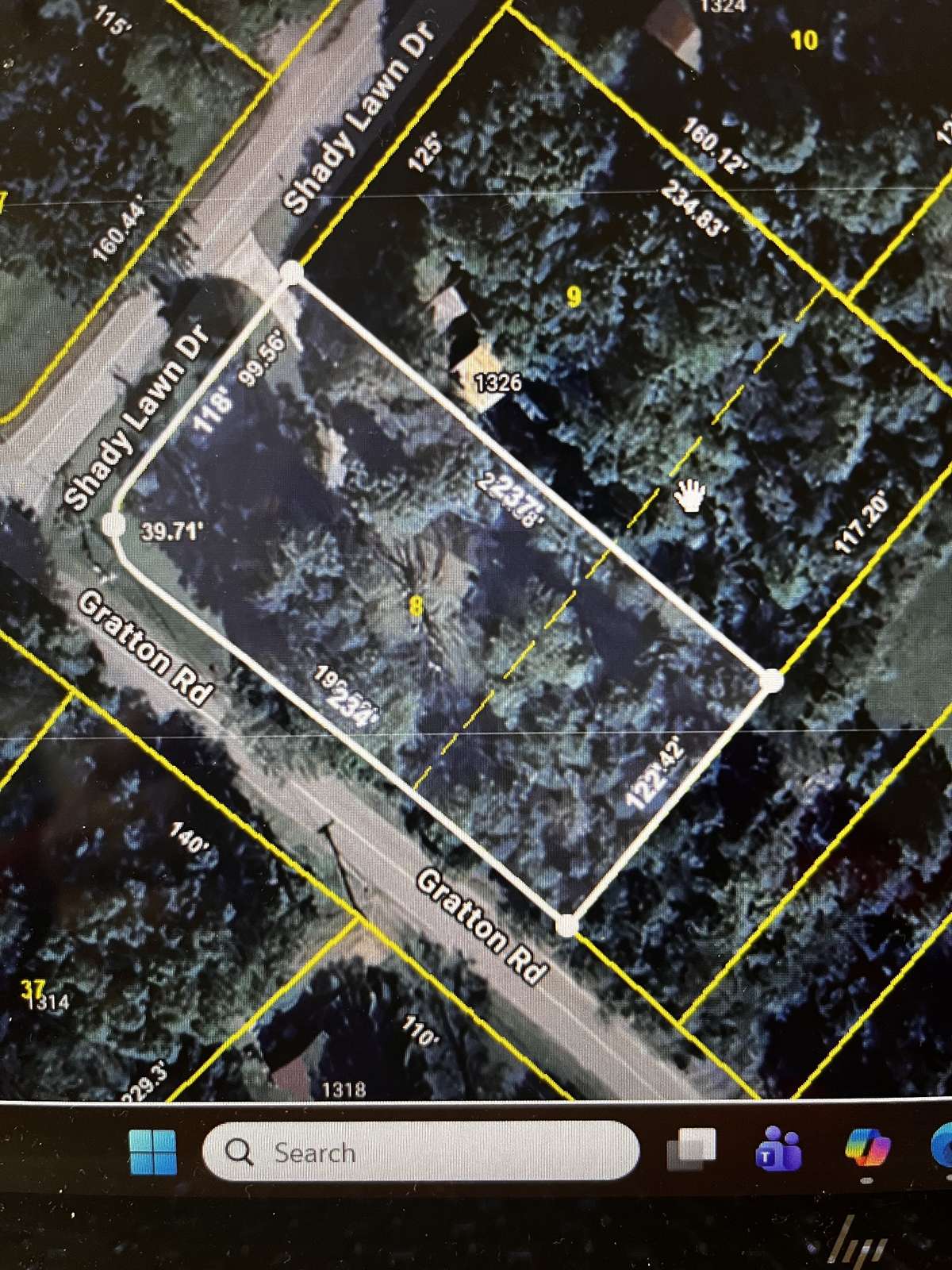 The corner lot and the adjacent lot are for sale with the house