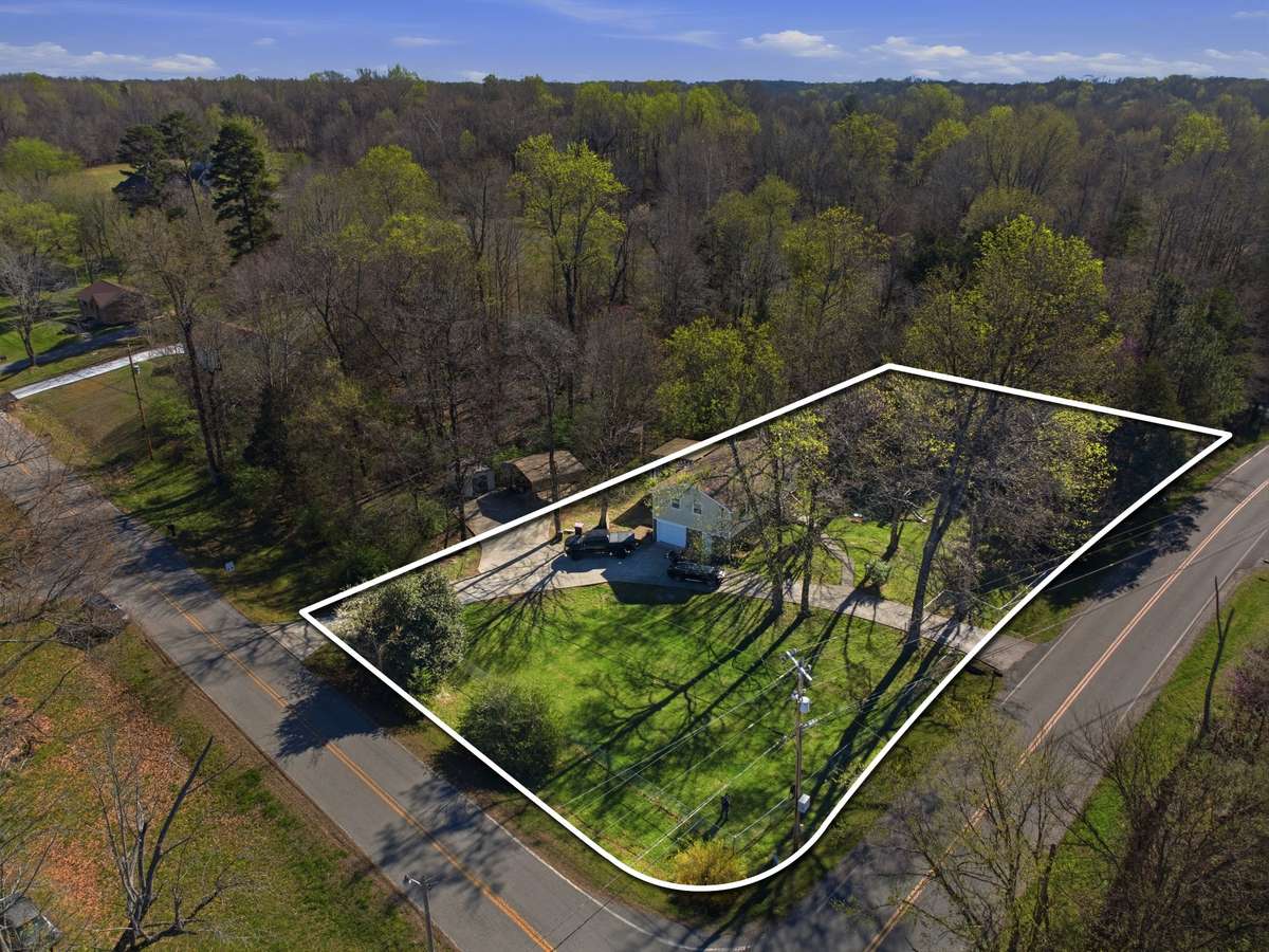 The side lot of 0.68 acres is also included in the sale of the property.