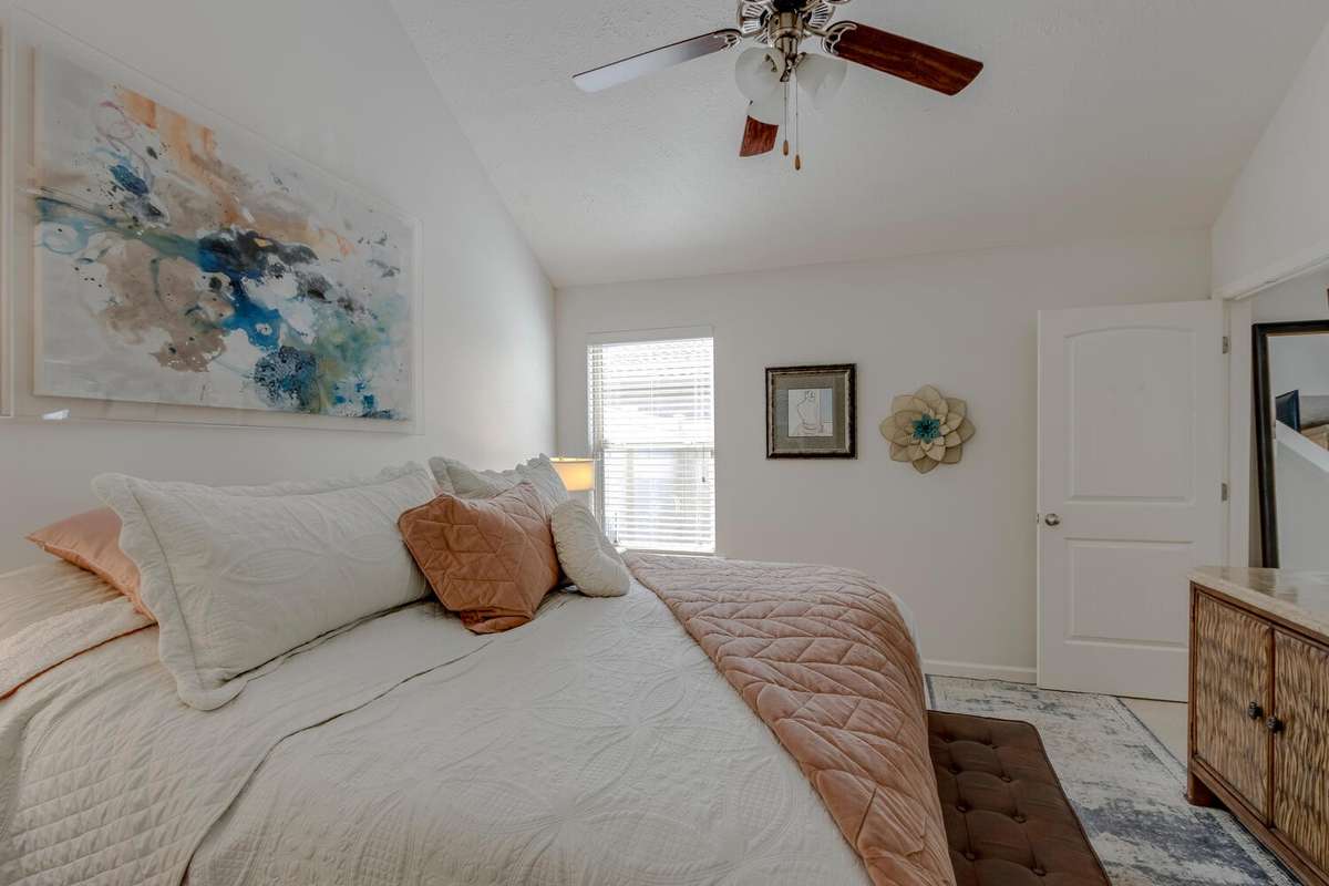 Cathedral ceilings are a perfect touch to this room.
