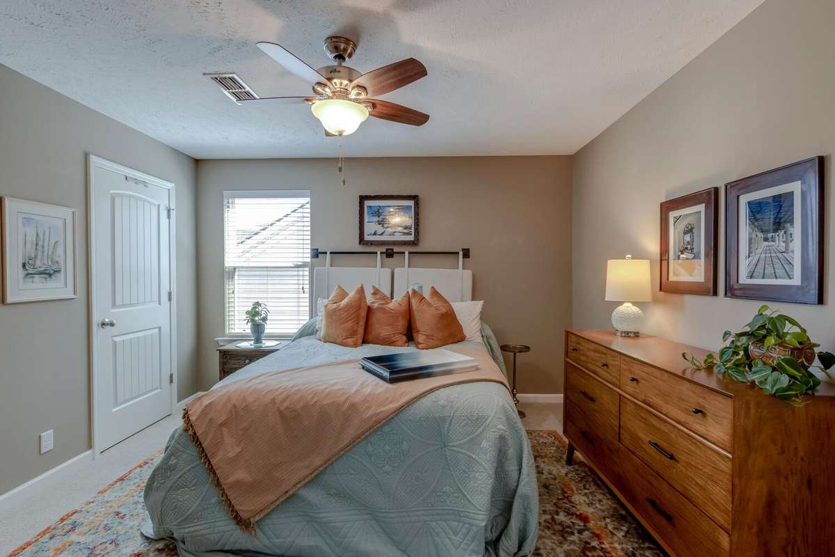 Great room and separate from the downstairs bedroom.