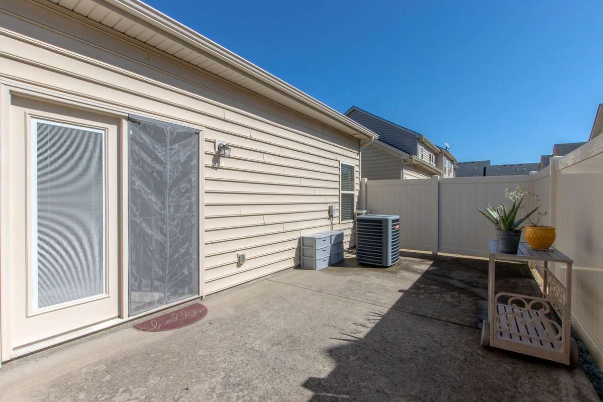 This is a large patio to unwind in privacy.