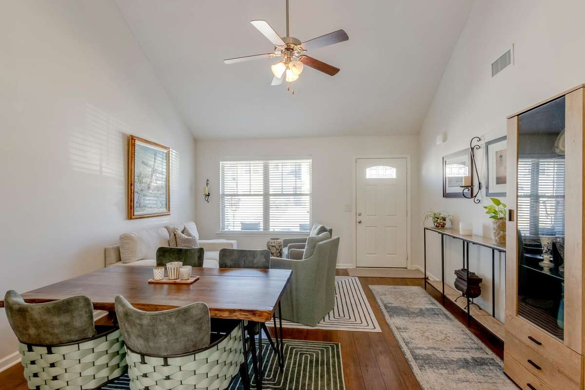 The lving room is so large they have even added a full-sized dining table.