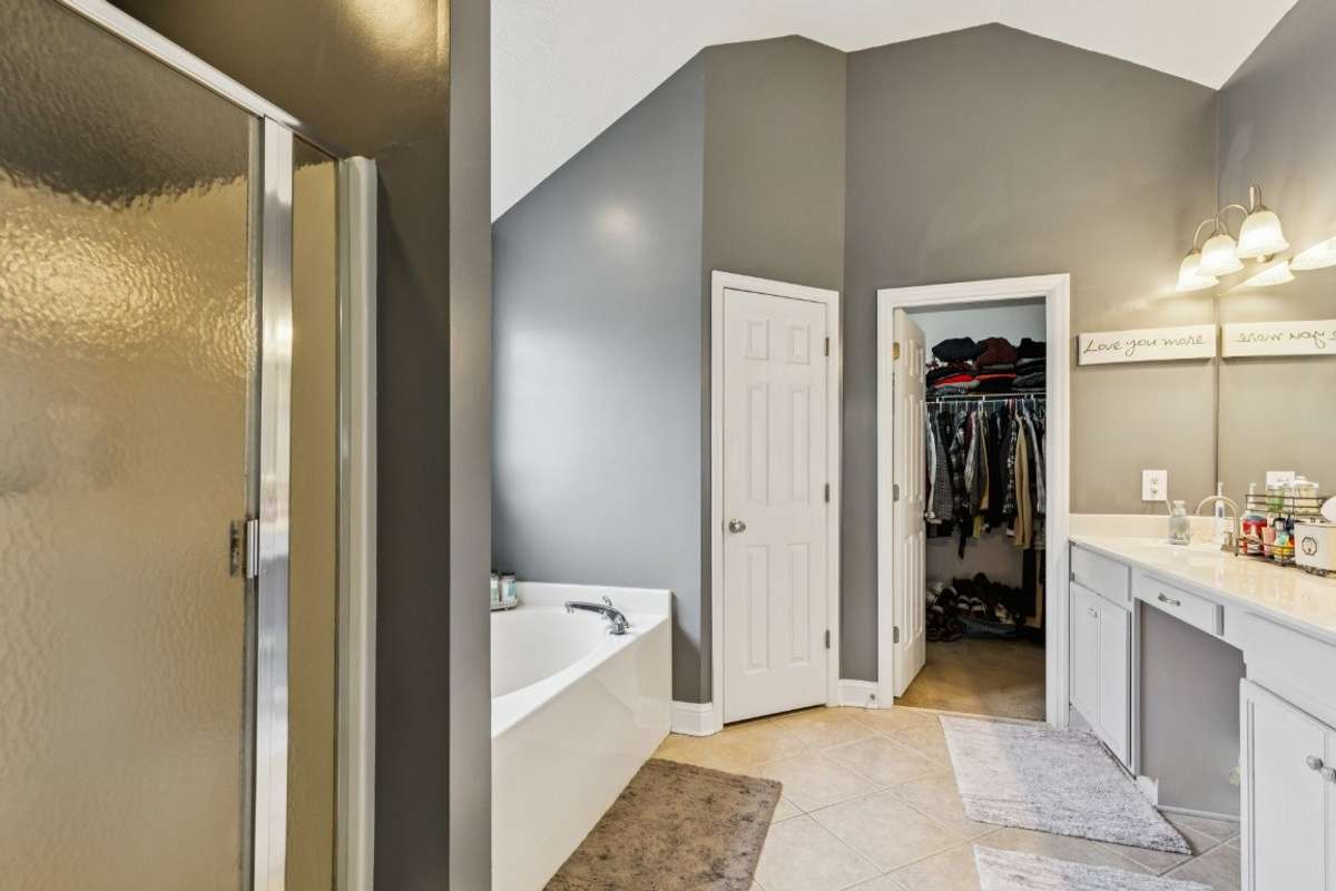 Primary bath with separate tub and shower
