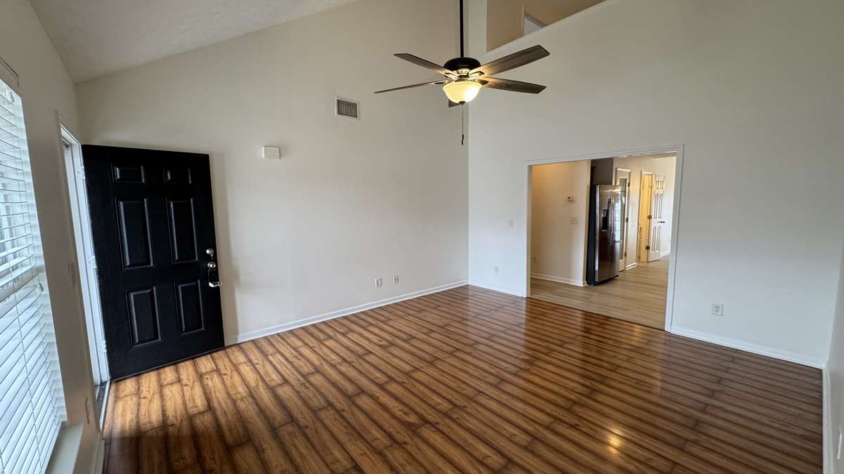 Living room located off Kitchen