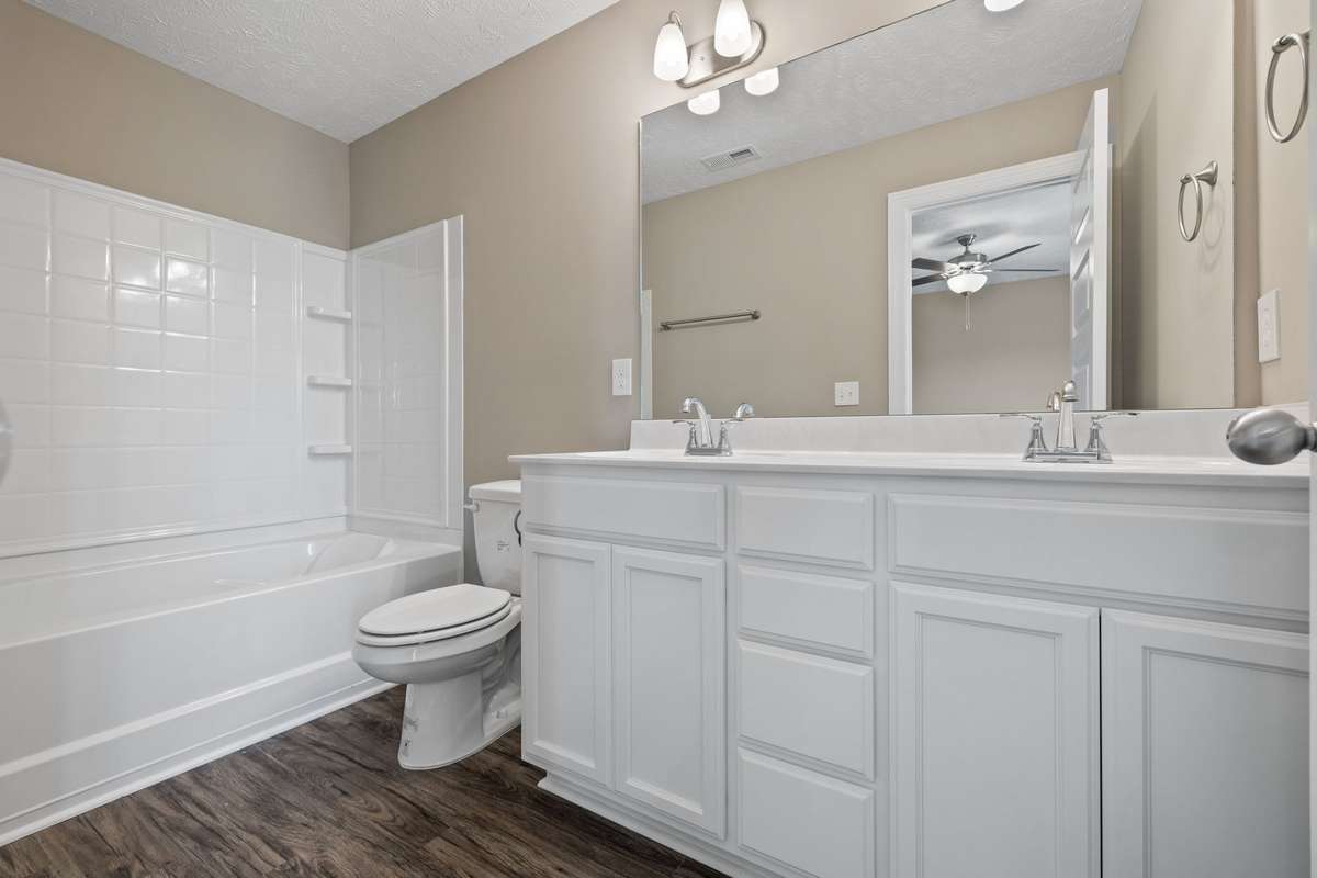 Custom Cabinets and Double Sinks in Primary Bath.