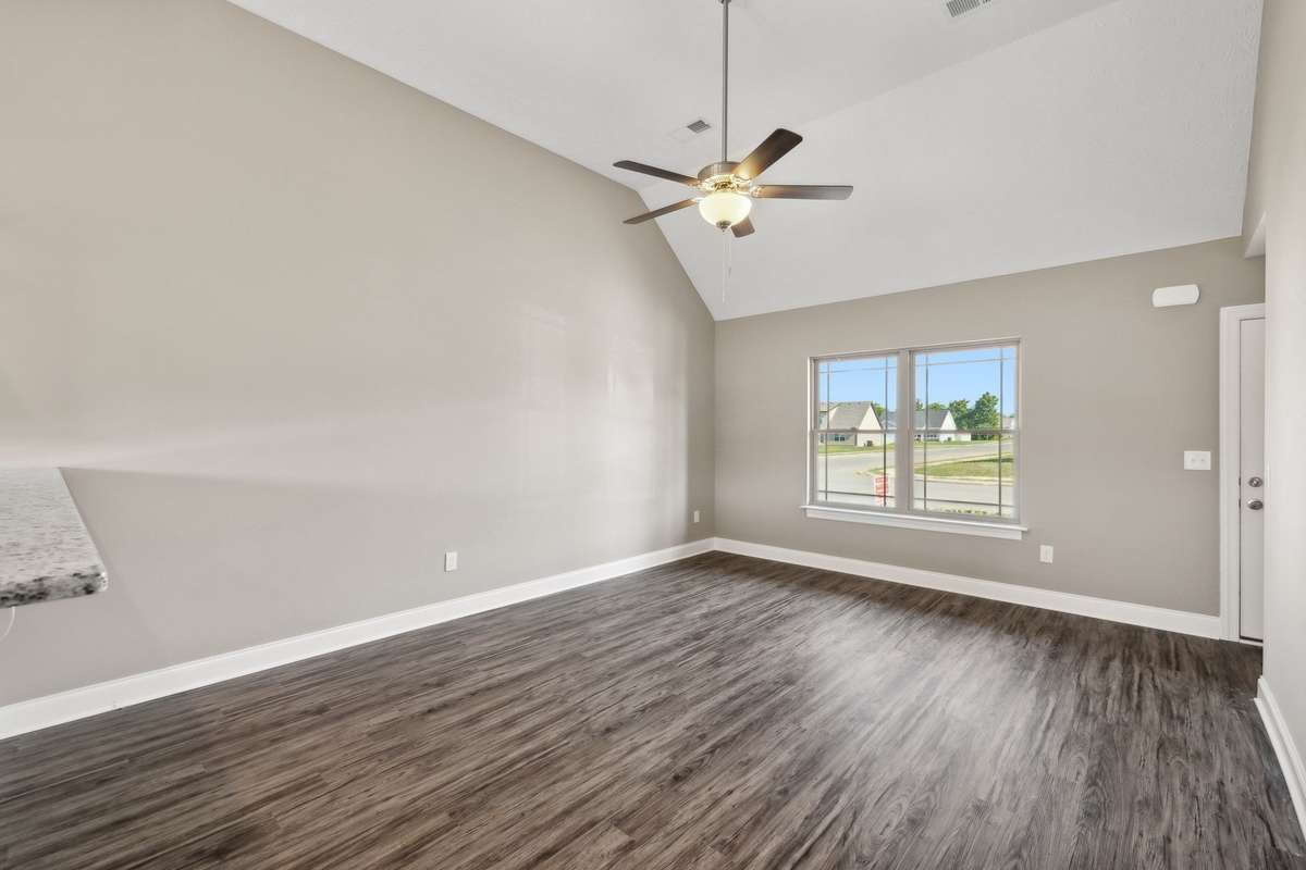 Spacious Living Room and Kitchen features Beautiful and Durable LV Plank Flooring.
