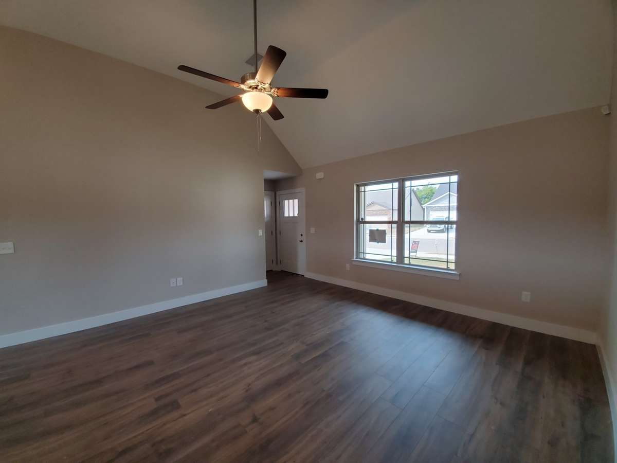 Beautiful LV Plank Floors in Living Room are very Durable and Easy Maintenance. 
Picture of Similar House.