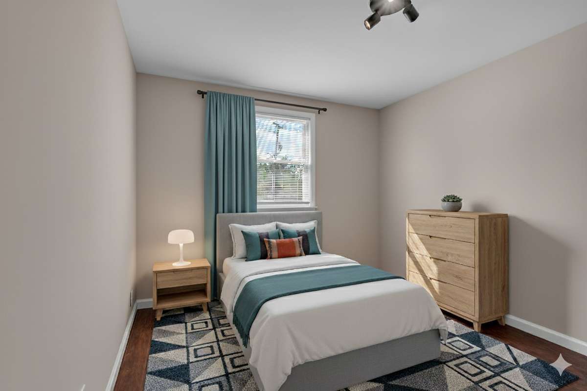 The third bedroom could alternatively serve as office space if desired.  This is the way the room looks virtually staged.