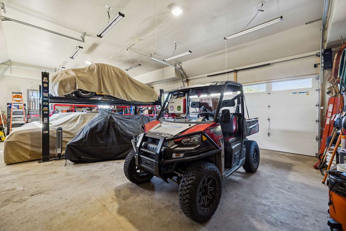 26X42 garage will accommodate 5 cars plus a car lift for car enthusiasts! 1372 Short Mountain Rd, McMinnville, TN 37110
