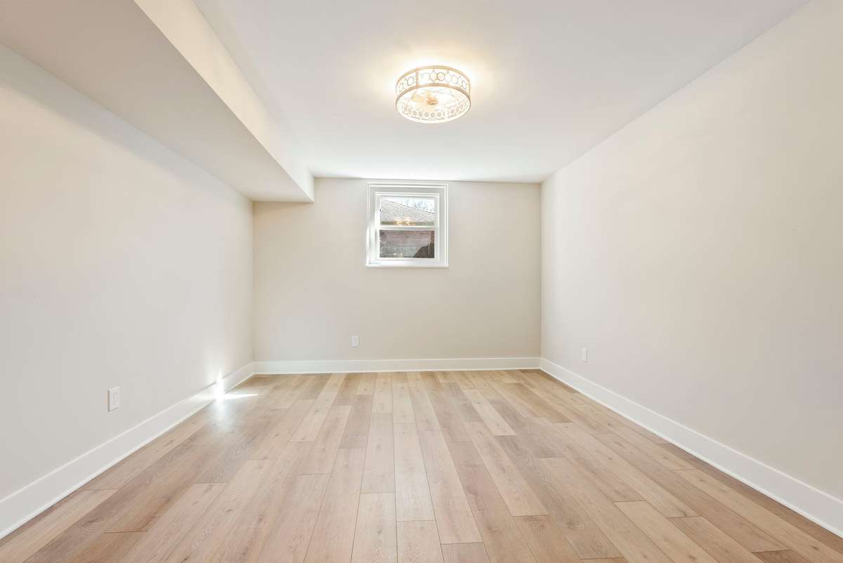 Spacious lower-level bedroom with fresh finishes throughout—perfect as a guest retreat or teen suite!  510 Iris Avenue, Murfreesboro, TN 37128