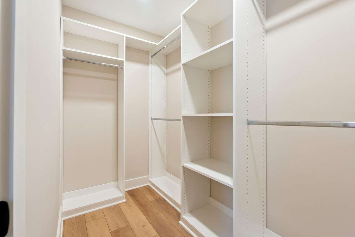 Primary suite's walk-in closet is fully equipped to help keep your space organized with built-in shelving! 510 Iris Avenue, Murfreesboro, TN 37128